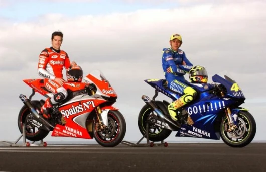 The 2004 M1 riders - Rossi won nine races and the title. Carlos Checa scored ONE pdium - a second place in France.