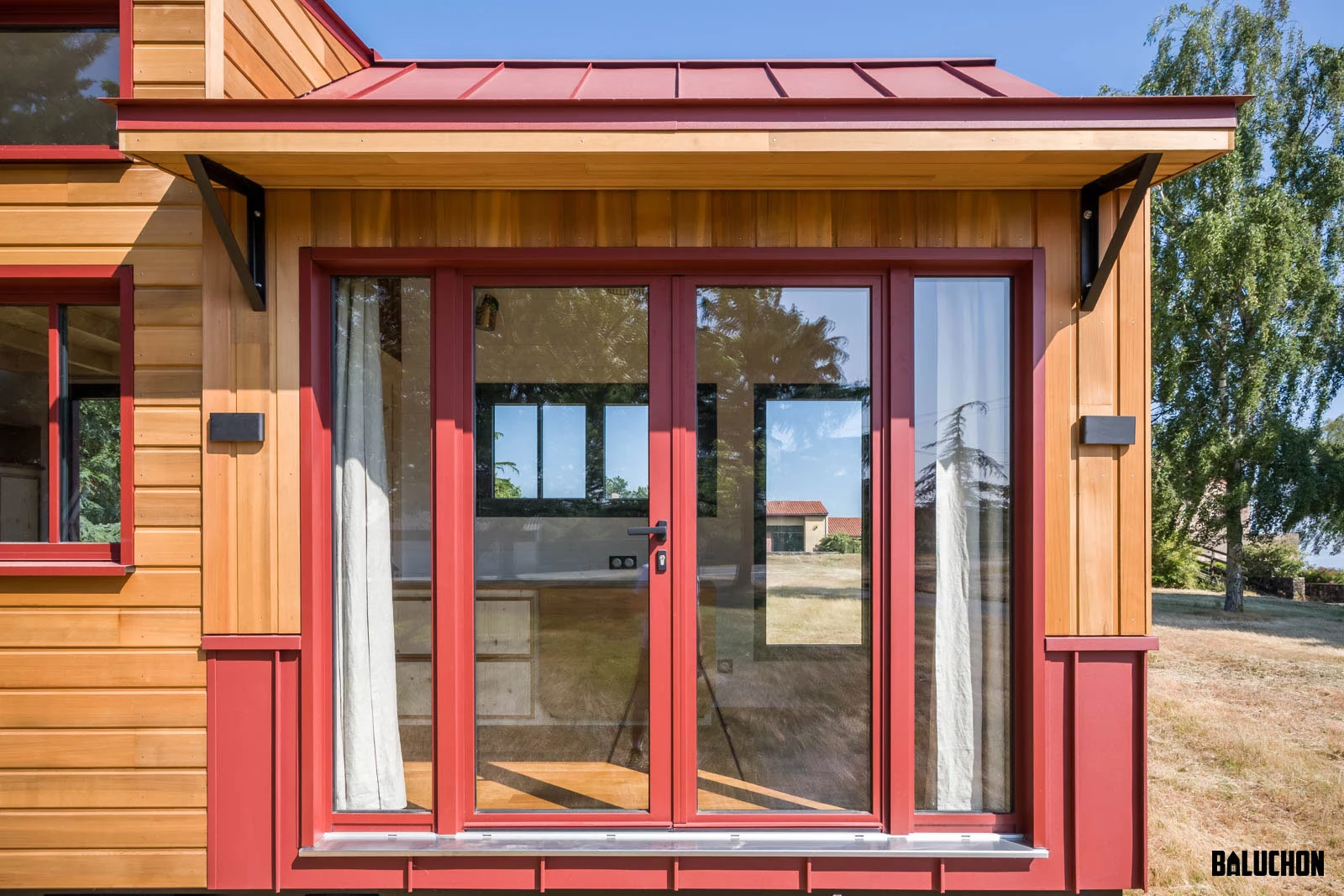 The Browny's glazed entrance is sheltered by a removable wooden awning