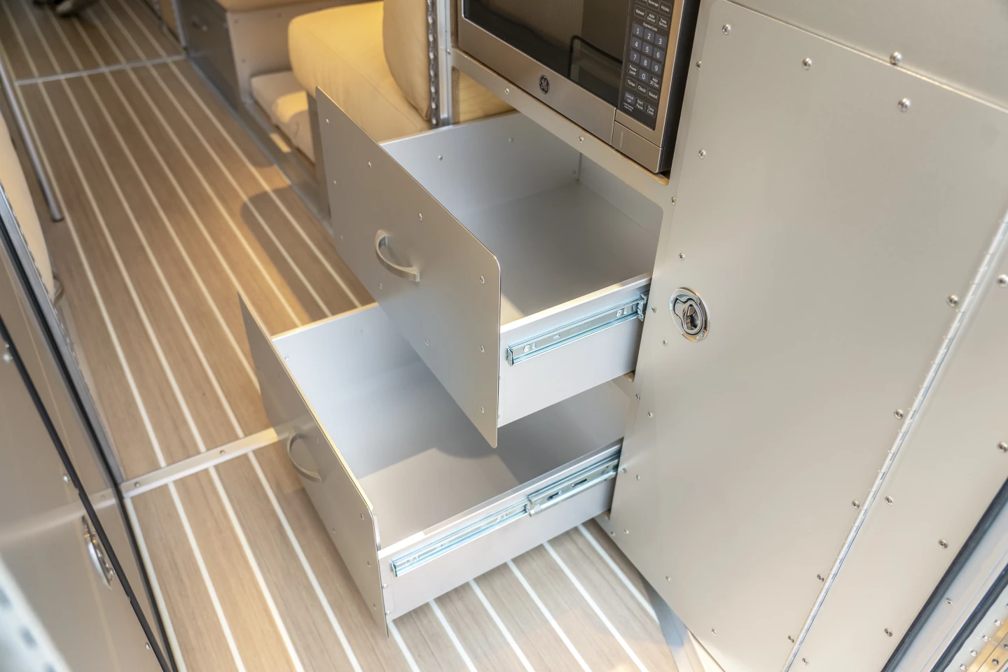 The kitchen welcomes larger drawers for improved storage