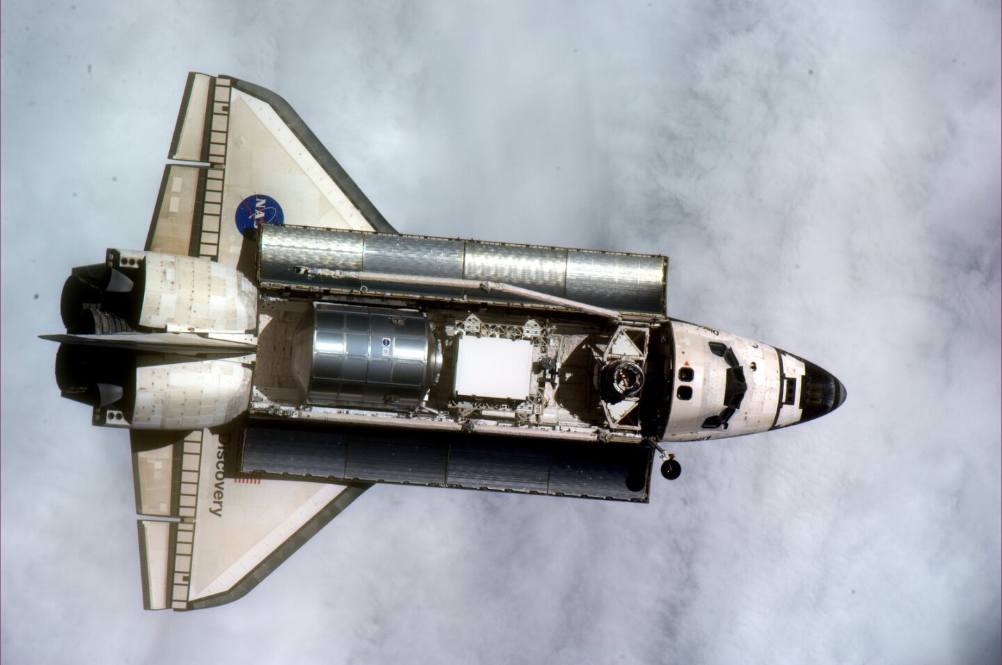 Photo of Discovery snapped in 2011, bringing Leonardo to the ISS for the last time