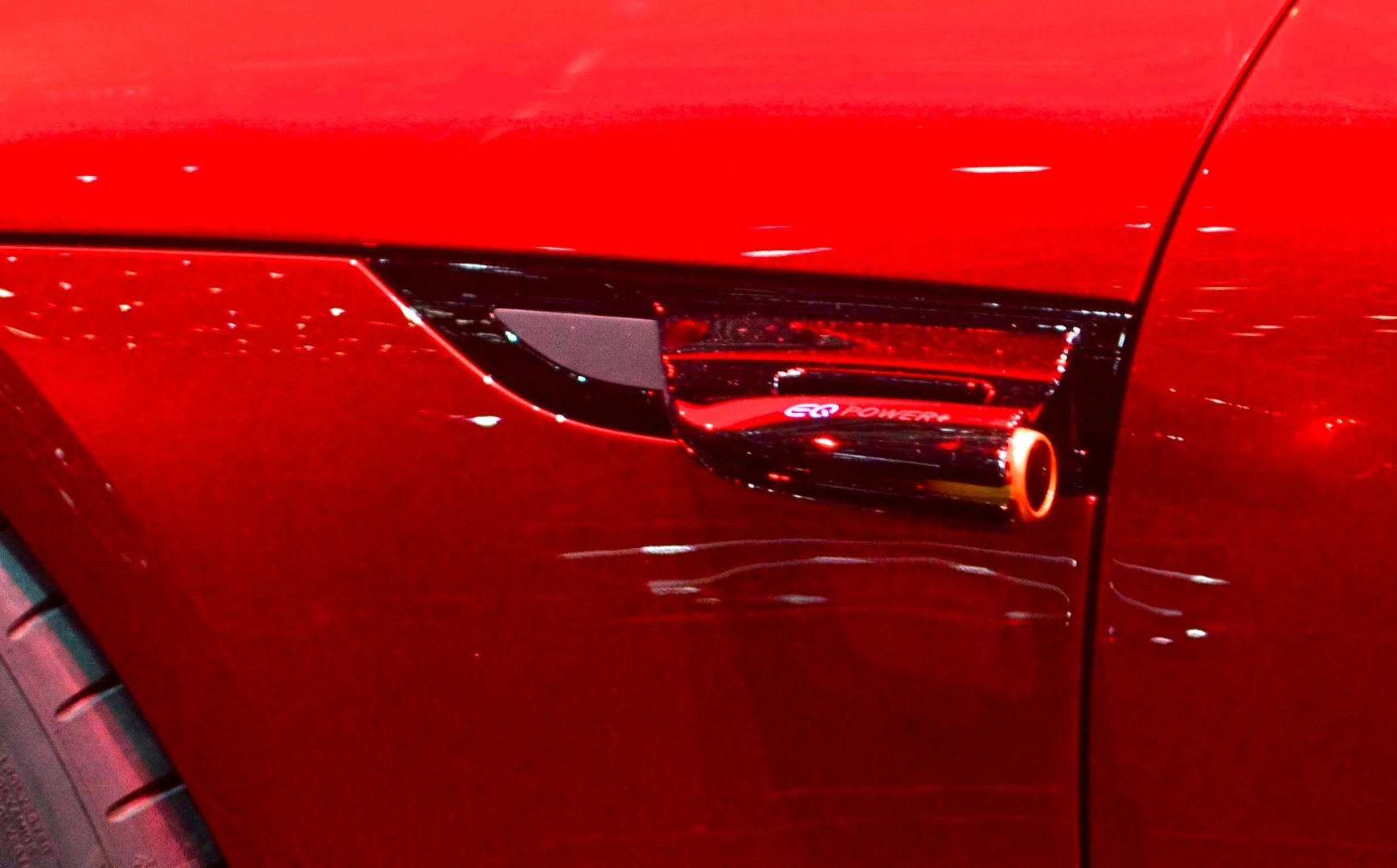 The side-view camera has more of a tubular construction than other side-view cameras, reminiscent of a wearable action cam