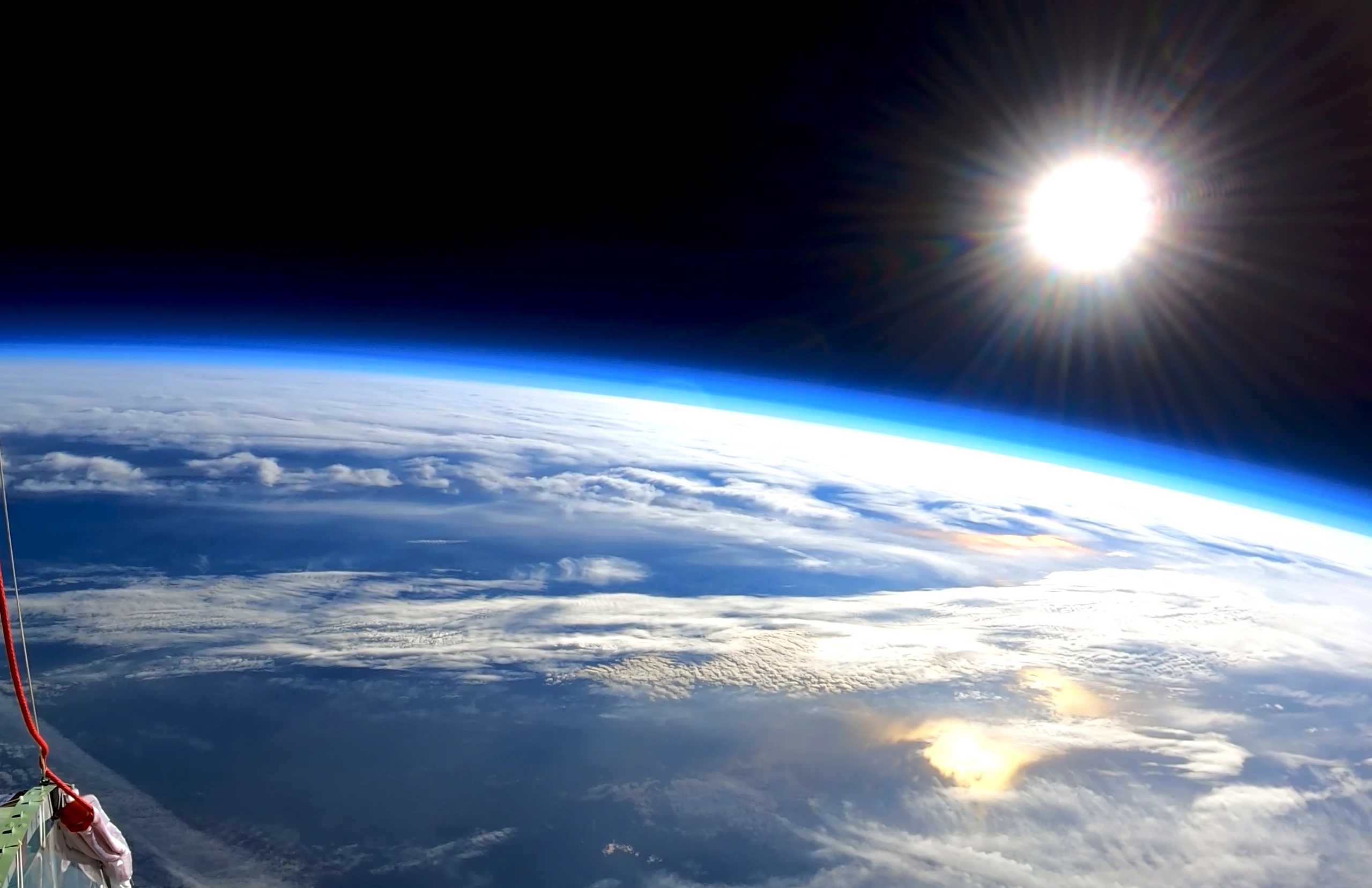 An image taken at 100,000 feet by Space Perspective's Neptune One unmanned test aircraft