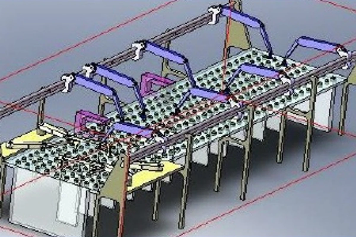 The SoftWear system uses an overhead "pick and place" robot system to move garments between work stations