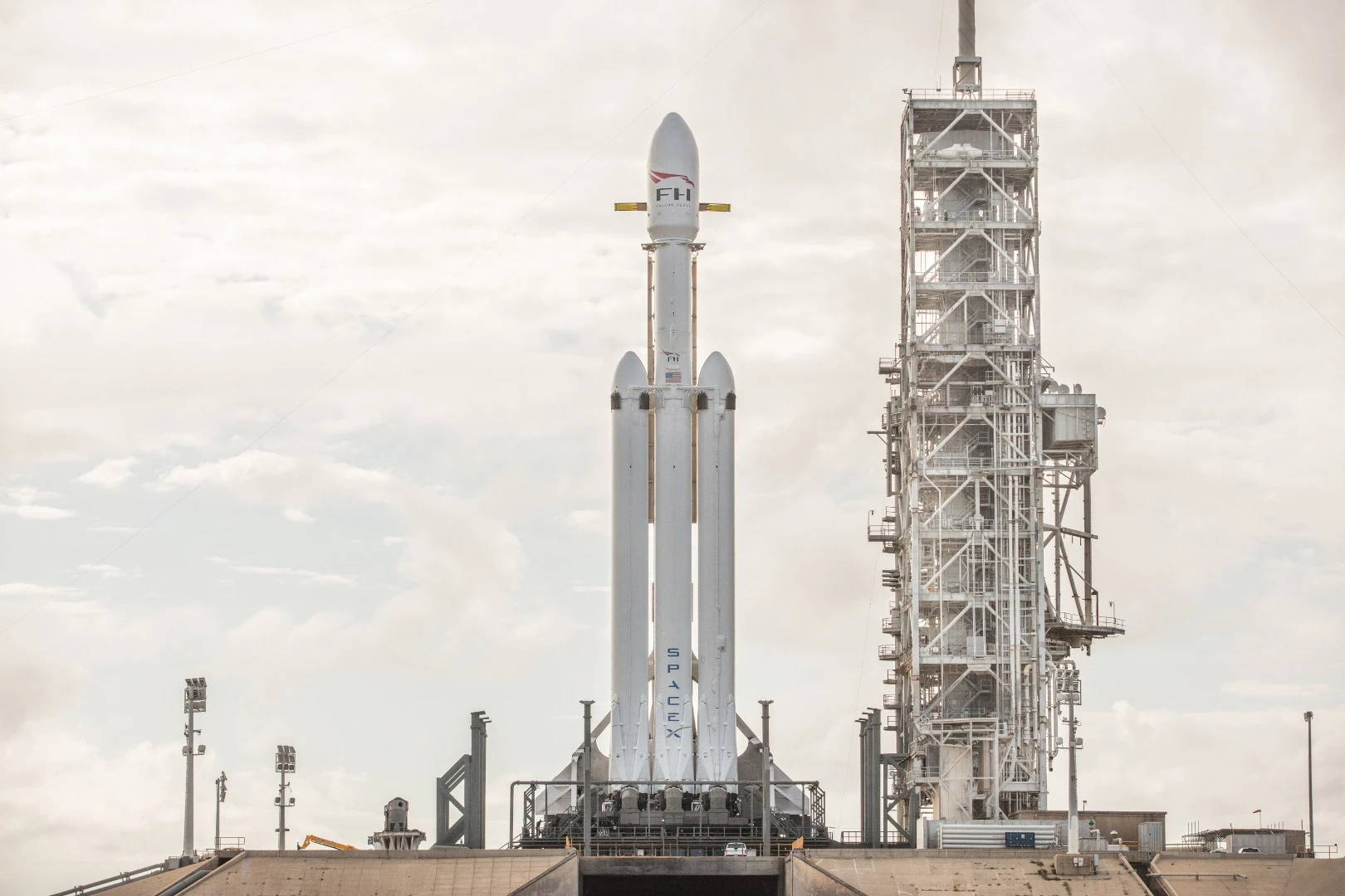 The Falcon Heavy sits on the pad ahead of launch