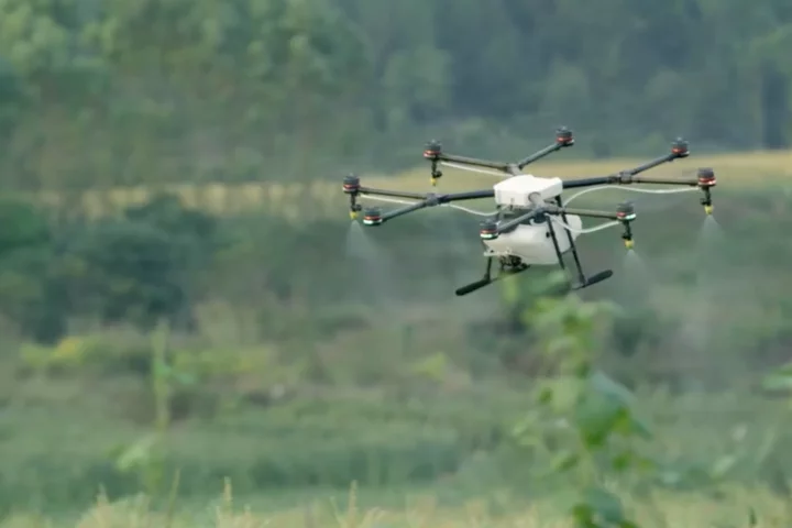 DJI's MG-1 system uses a wave radar to zoom over crops at a consistent altitude