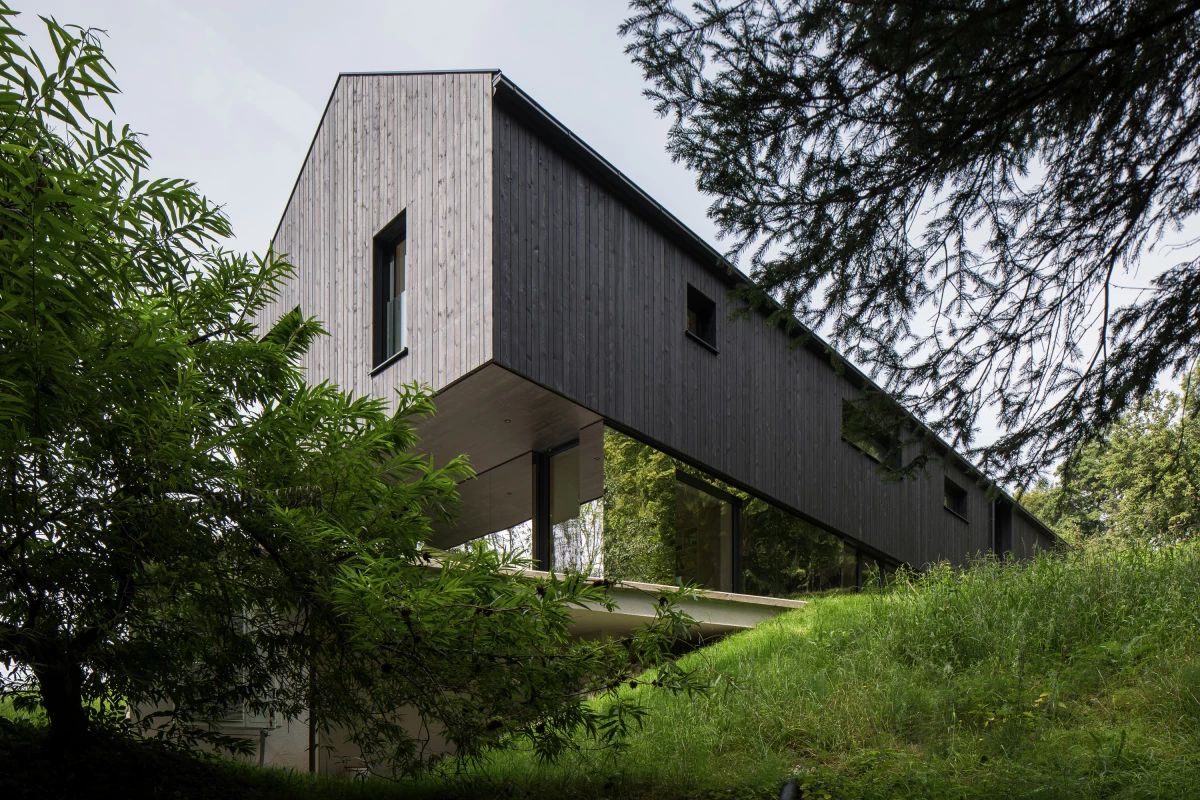 The Mountain House, an elegant rectangular-shaped home built into the slopes of the Austrian alps