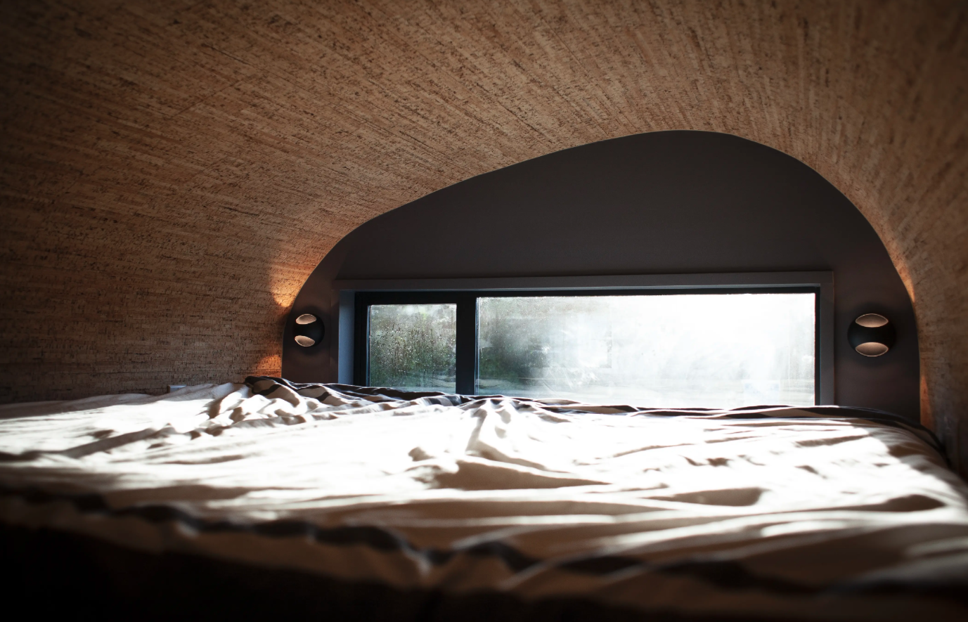 The S'Mouse City Model features a loft-based sleeping area that has a low ceiling