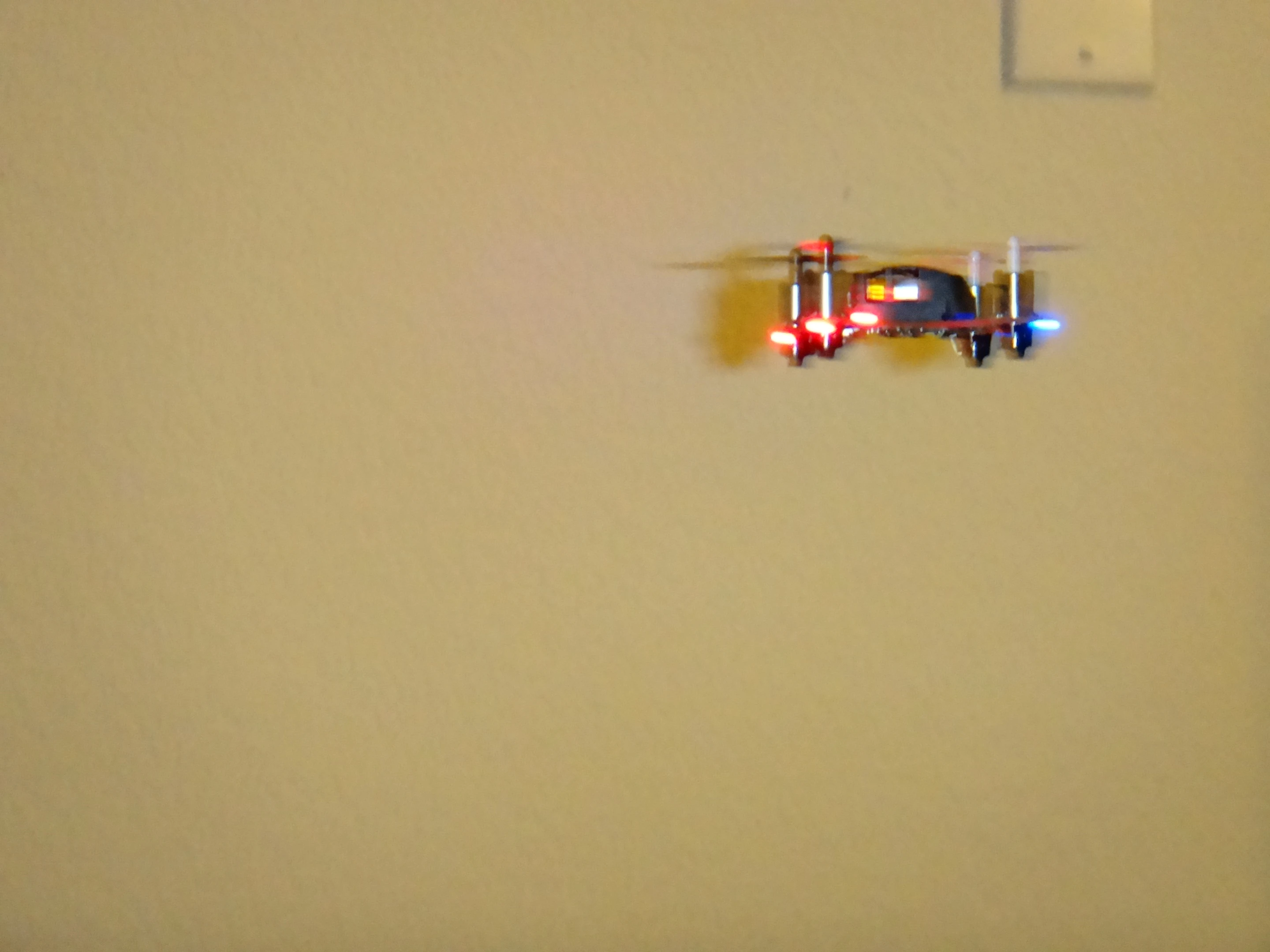 Hovering in place takes a bit of practice, since the slightest breeze will knock it off course and the bundled transmitter can be difficult to use