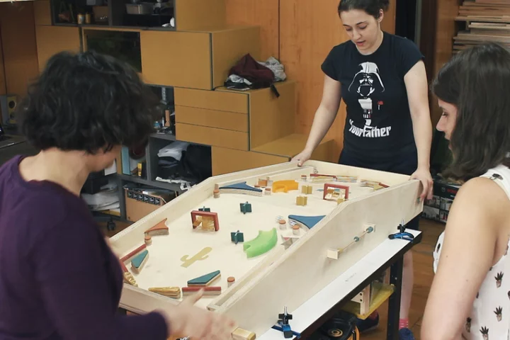 A delightfully low tech two-player pinball machine made by Cristiana Felgueiras