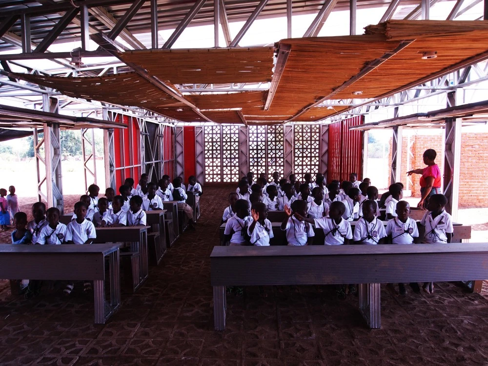 Though primarily used to teach children, the building also serves as an adult training center, market, and community center on evenings and weekend (Photo: Architecture for a change)