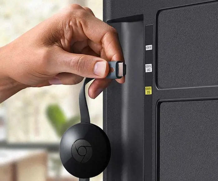 The Chromecast plugs into a TV's HDMI port, and is powered via USB