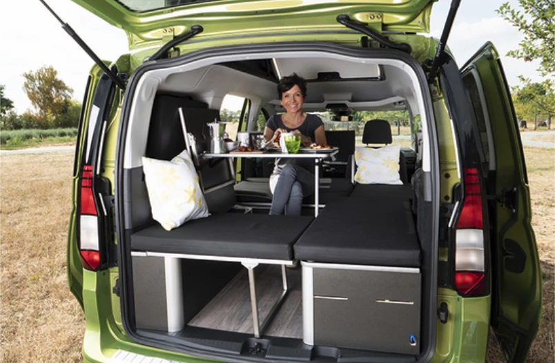 Enjoying a meal inside the Caddy Weekender 2