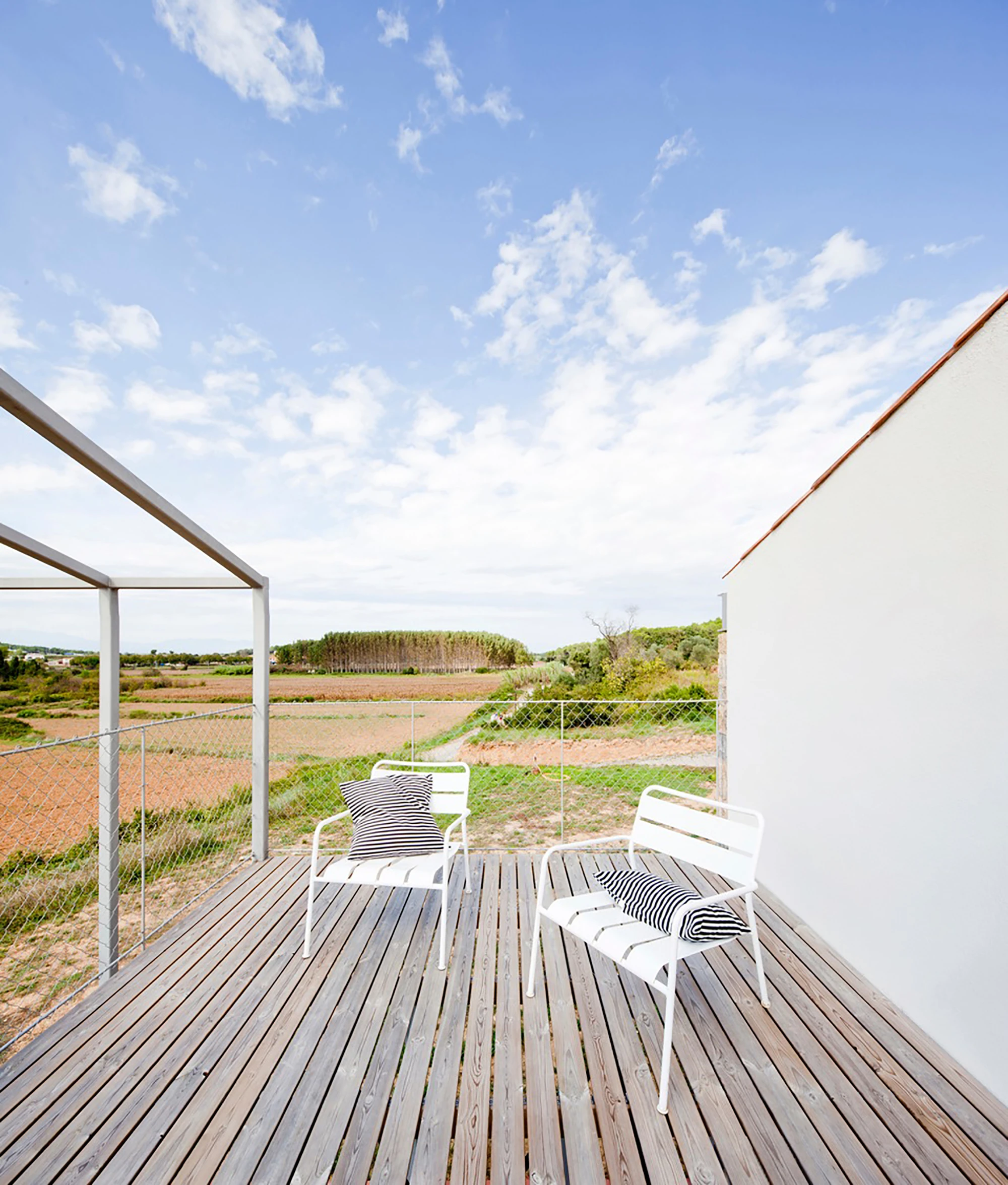 A rainwater collection system stores water in an underground water tank, for irrigation and toilet flushing (Photo: Anna & Eugeni Bach)