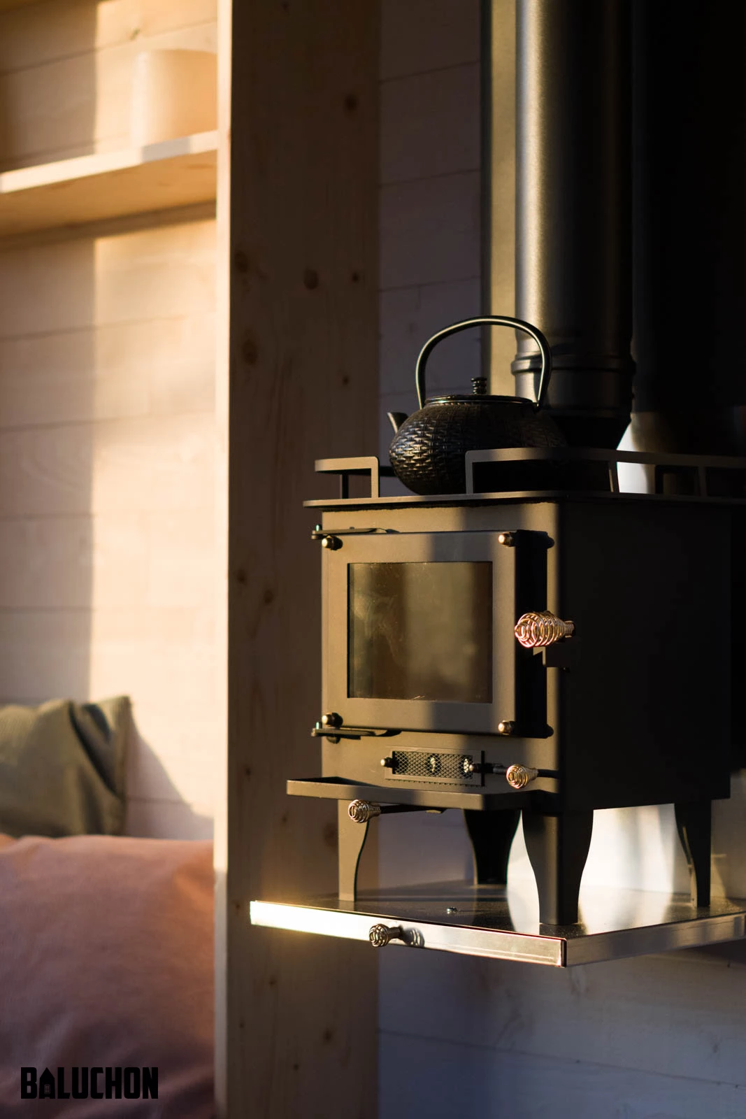 The Tiny House Nottingham is heated with a small wood-burning stove