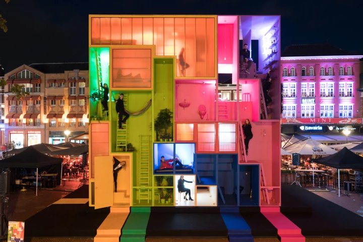 The nine colorful blocks that make up the nine-meter-tall (30 ft) Wego installation are stacked together in a Tetris meets Snakes and Ladders kinda way