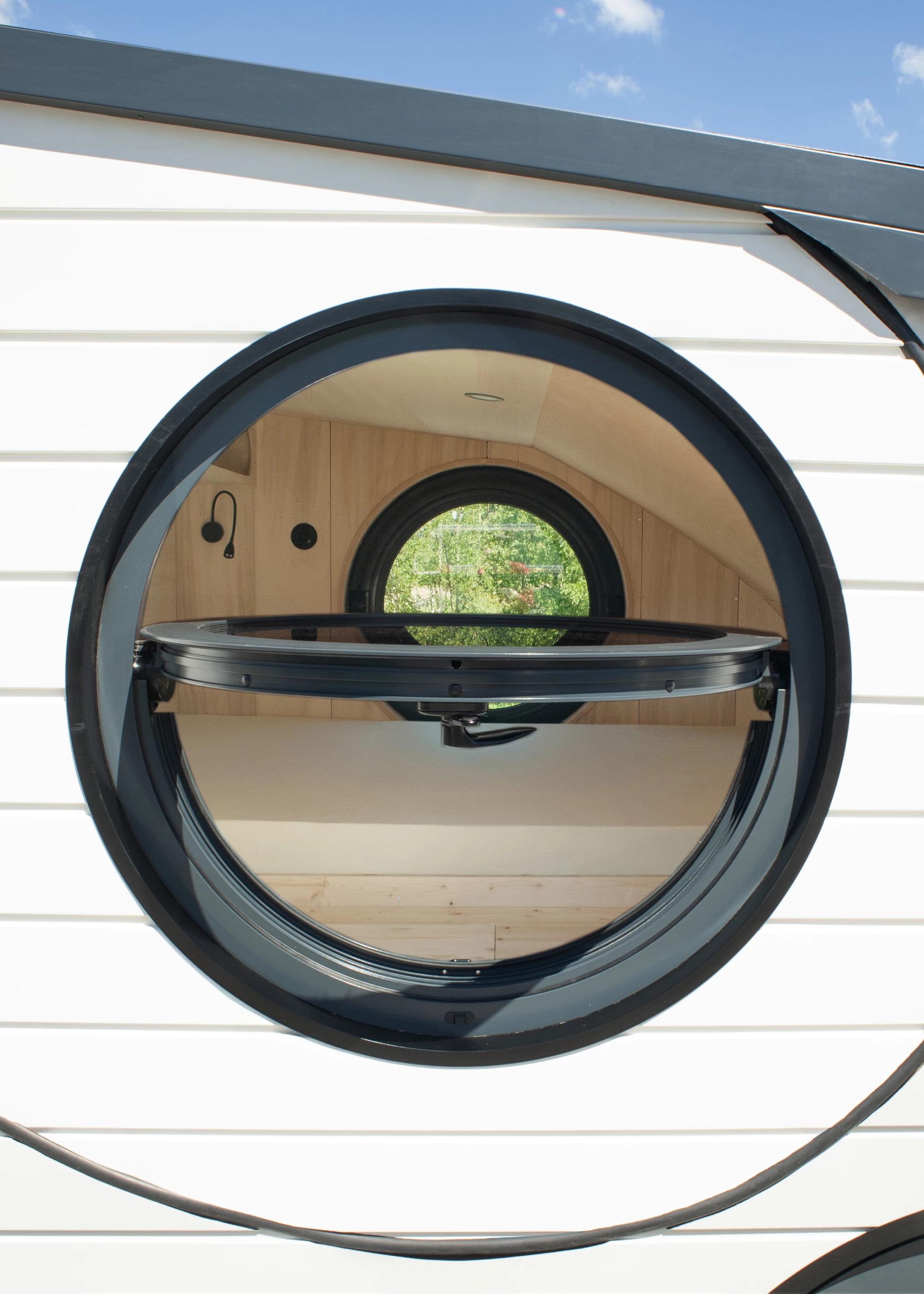 The Grand-Duc's bedrooms feature distinctive porthole-style windows