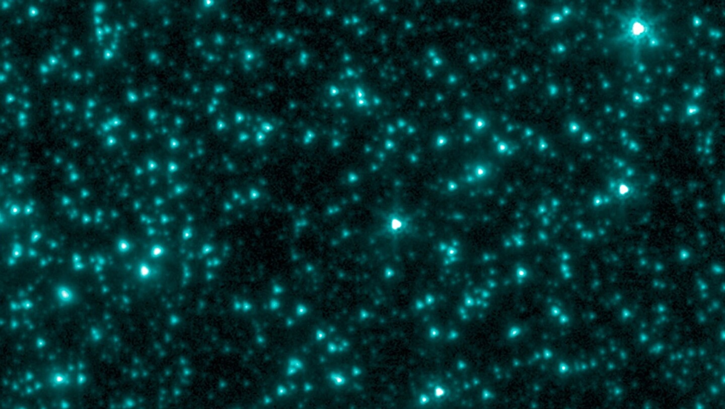 An image from NASA's Spitzer Space Telescope shows an infrared view of a sky area in the constellation Ursa Major