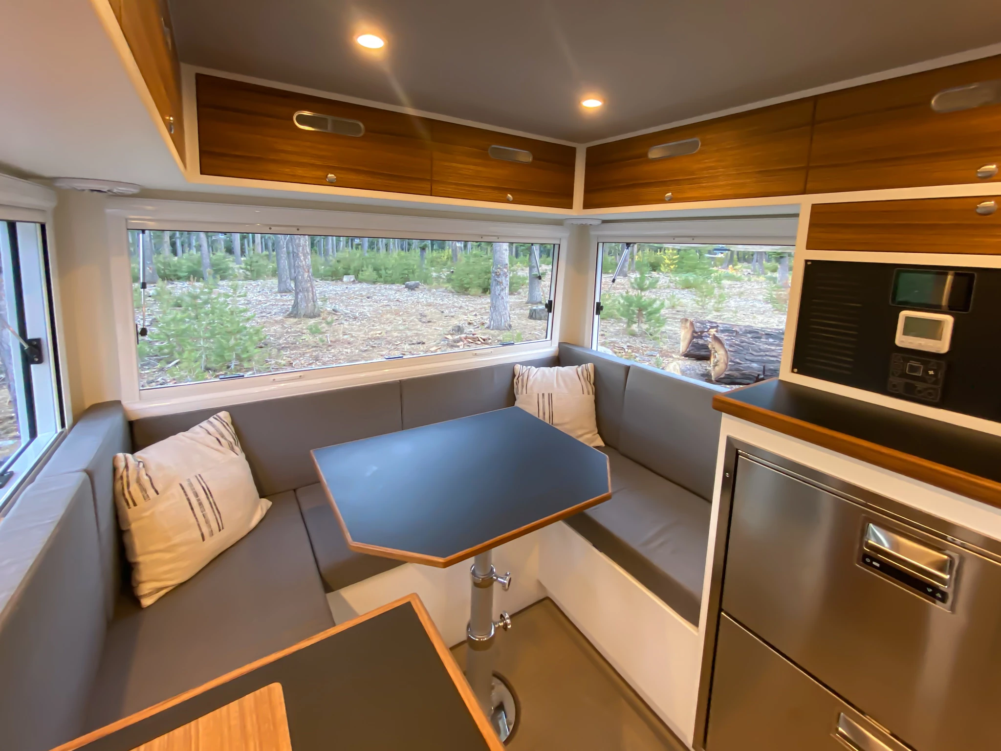 The TruckHouse BCT is designed for up to four adults with its U-shaped dinette that becomes a second bed