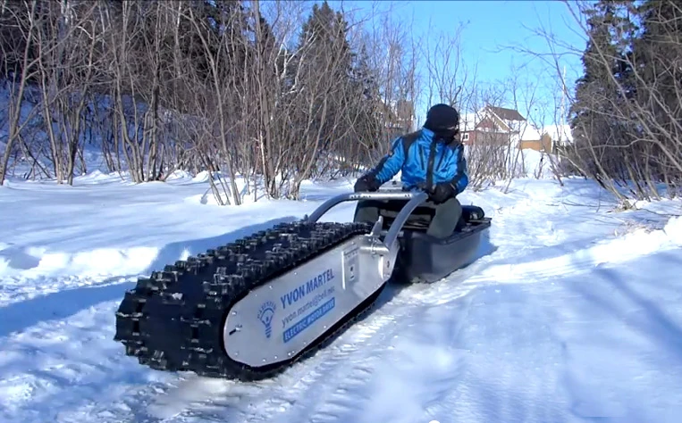 The MTT-136 (short for "My Track Technology" and the 136 inch snowmobile tread) is capable of doing the grunt work across some very tough terrain