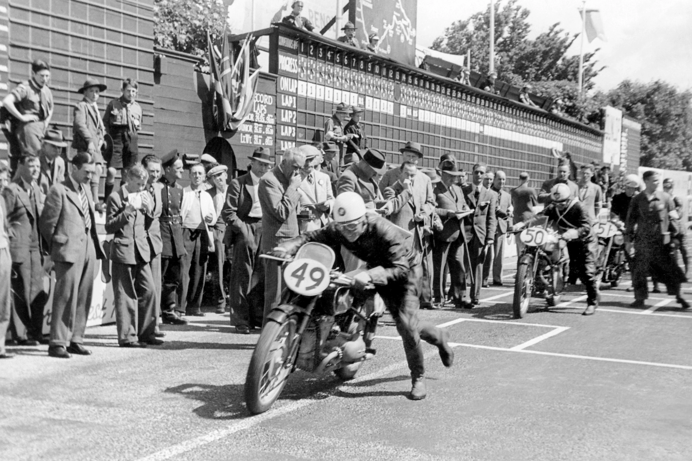 The BMW RS 500 won both the German and European 500cc championships in 1938, but could only manage fifth place at the TT with English rider Jock West aboard. In 1939, the supercharged DOHC horizontally-opposed twin-cylinder BMW RS500 Type RS255 reached its zenith, with a balance of speed (220kmh), light weight (138 kg / 304 lb) and superb roadholding good enough to finally take a win at the Isle of Man in the Senior TT.