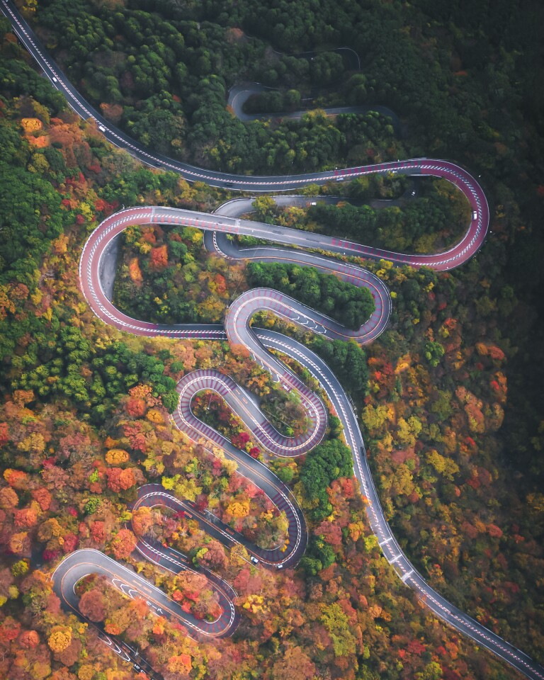 This is an aerial photograph of a mountain road in Hakone, Japan