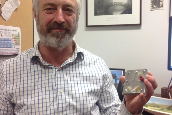 Associate Professor John Andrews with an experimental preliminary proof of concept proton flow battery system (Photo: RMIT)
