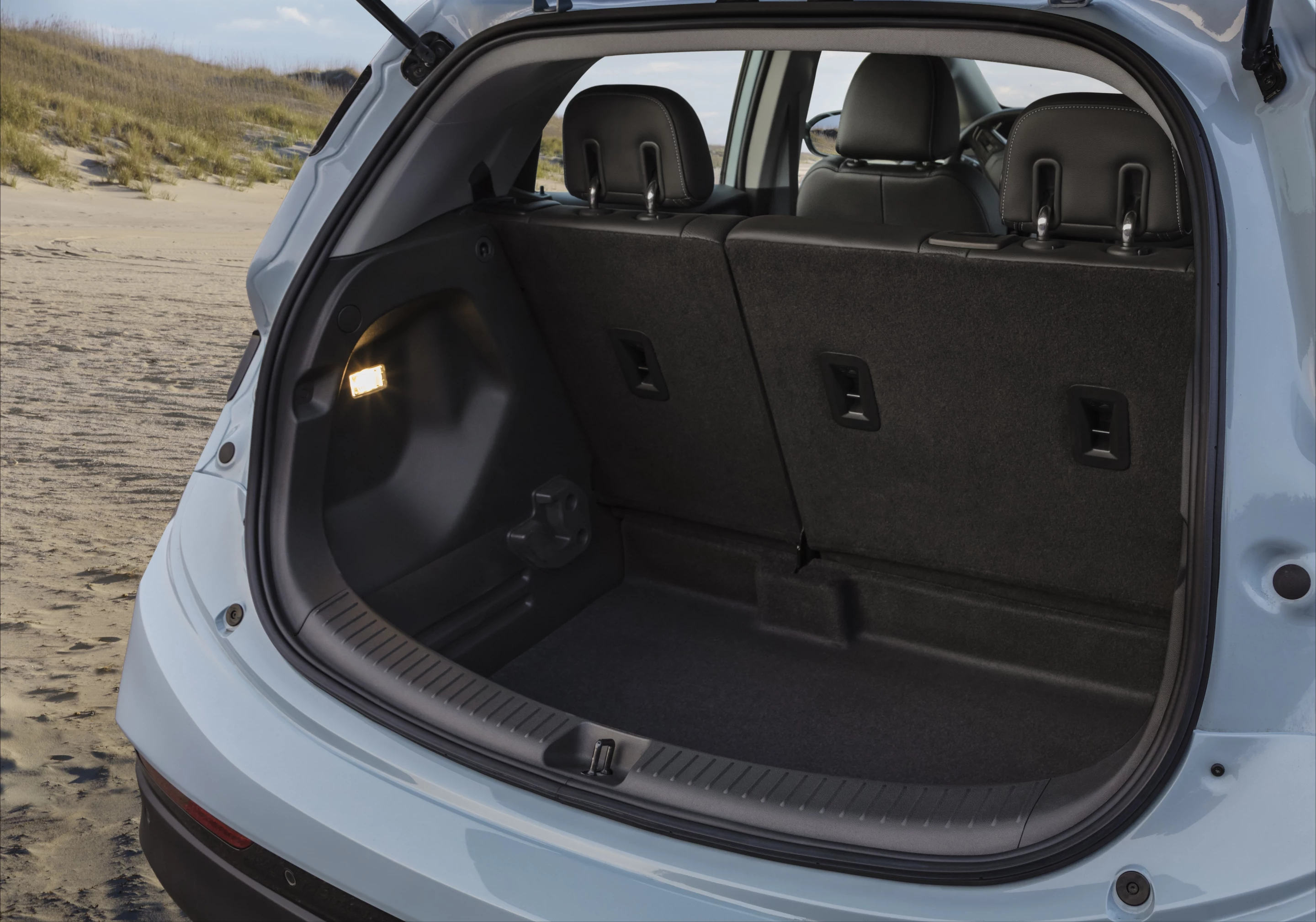 The smaller rear storage area of the Bolt EV