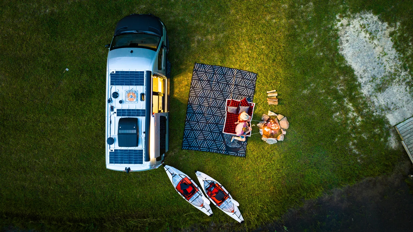 A view from above at backcountry basecamp with the Airstream Interstate 19X, which comes standard with 250 watts of rooftop solar and an air conditioner