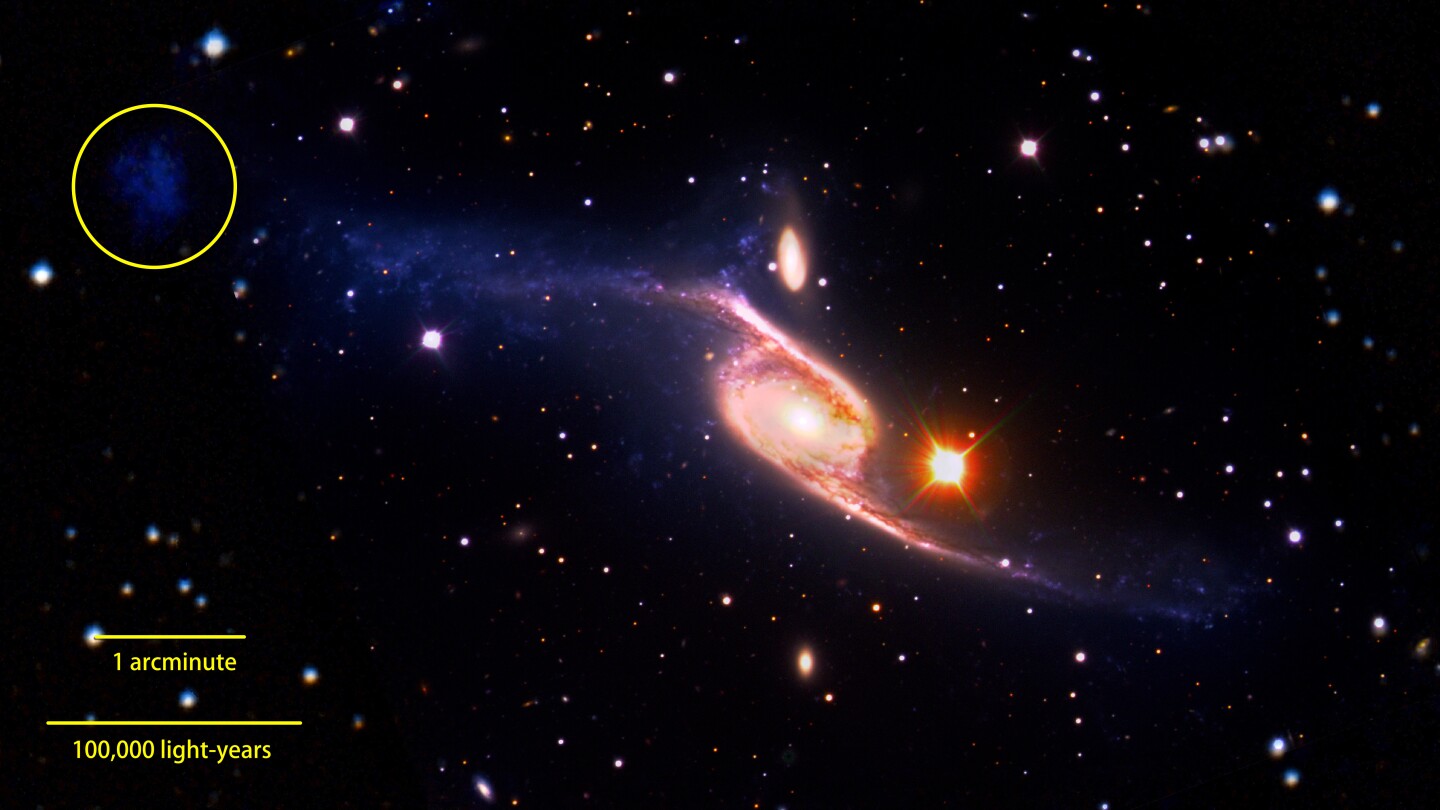 The tidal dwarf galaxy seen here is thought to have been created by the collision of NGC 6872 and IC 4970