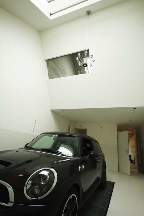 The ground floor space can be used as a garage or a light studio space (Image: Hertha Hurnaus)