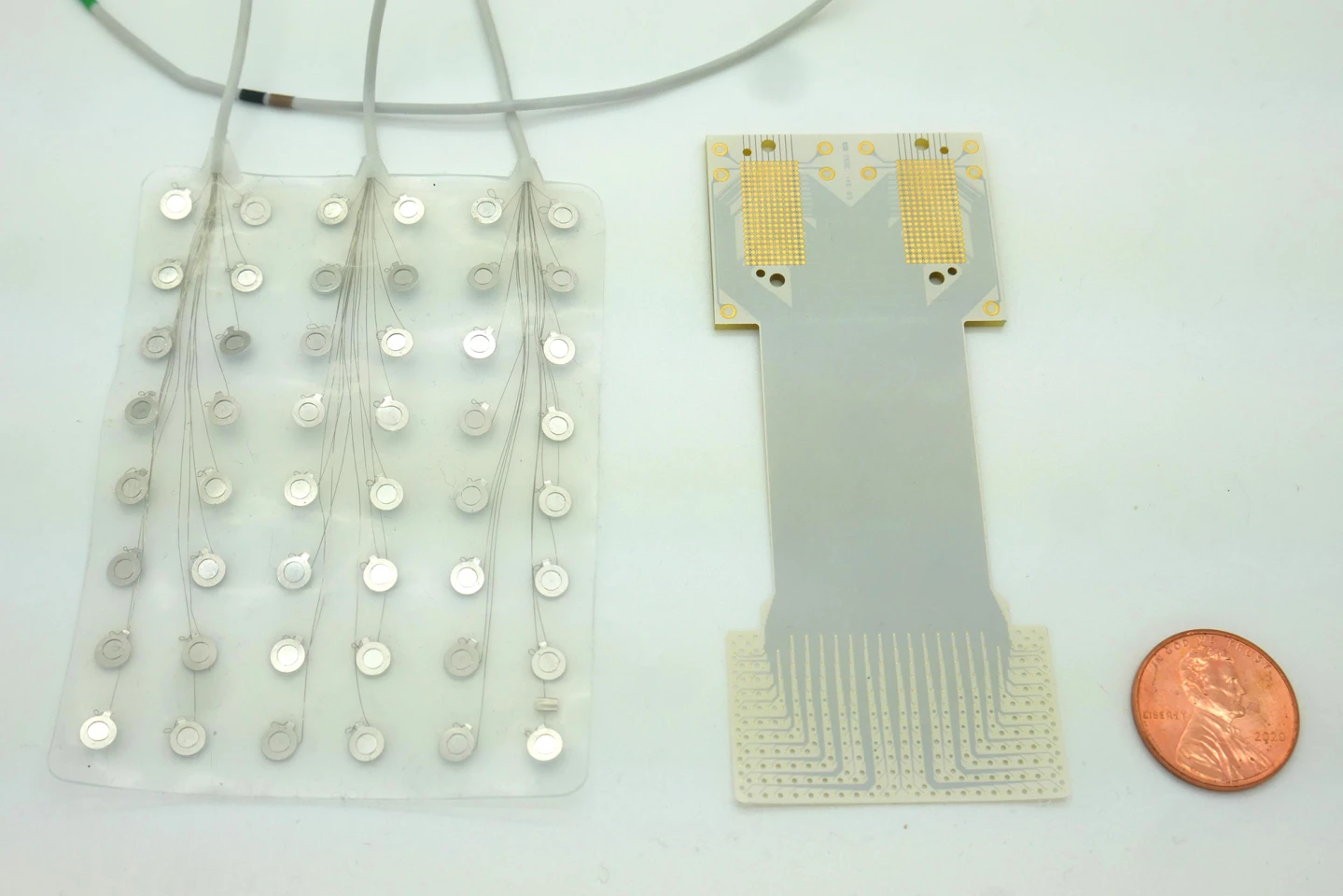Compared to other devices (left), Duke's device has twice as many sensors and is smaller