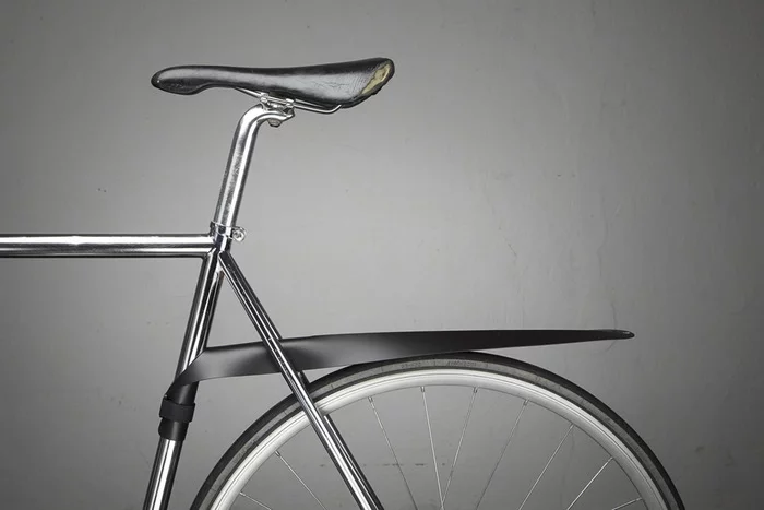 The Musguard is a bicycle mudguard that detaches from the bike and rolls up when not in use