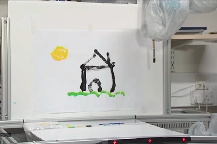 The work of art created by a robotic arm controlled entirely by a person's eye movement