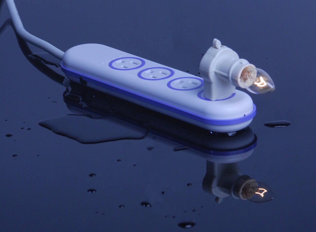 Wet Circuits water resistant power strip with overheat prevention and protection from fire hazards