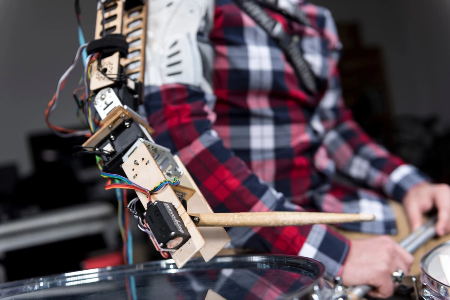 The "third arm" wearable is able to respond to both the music being played and the movements of the player