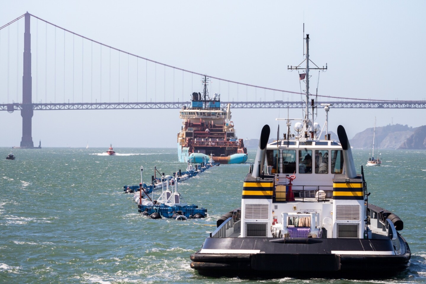 The Ocean Cleanup Project’s long-awaited collection system is towed out to sea