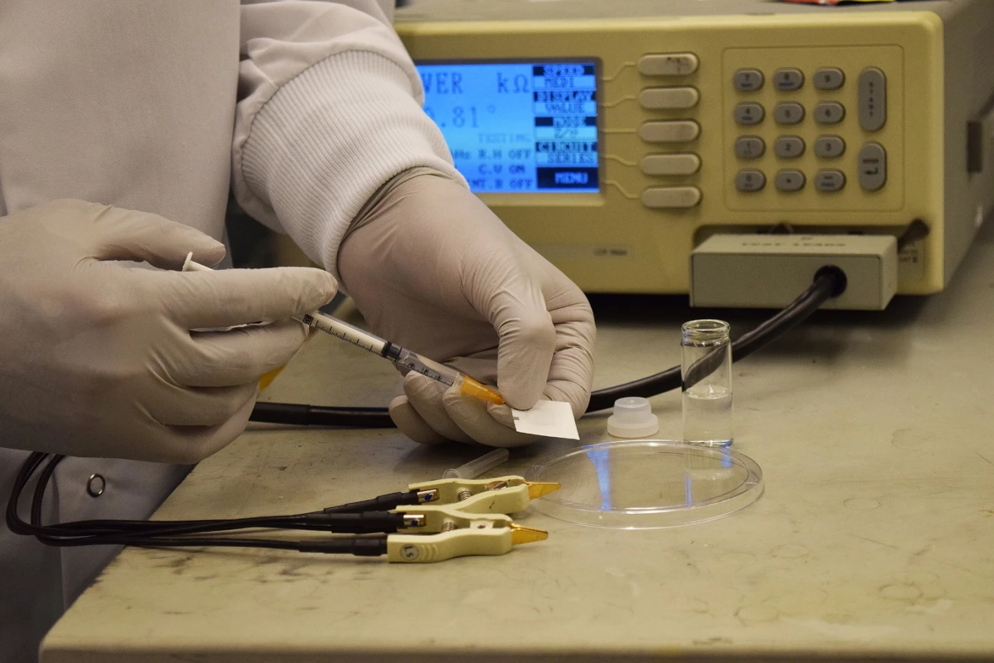 After wearing the badge, a drop of water is added to the yeast colony to test radiation exposure – the more yeast cells that have died, the more radiation the wearer was exposed to