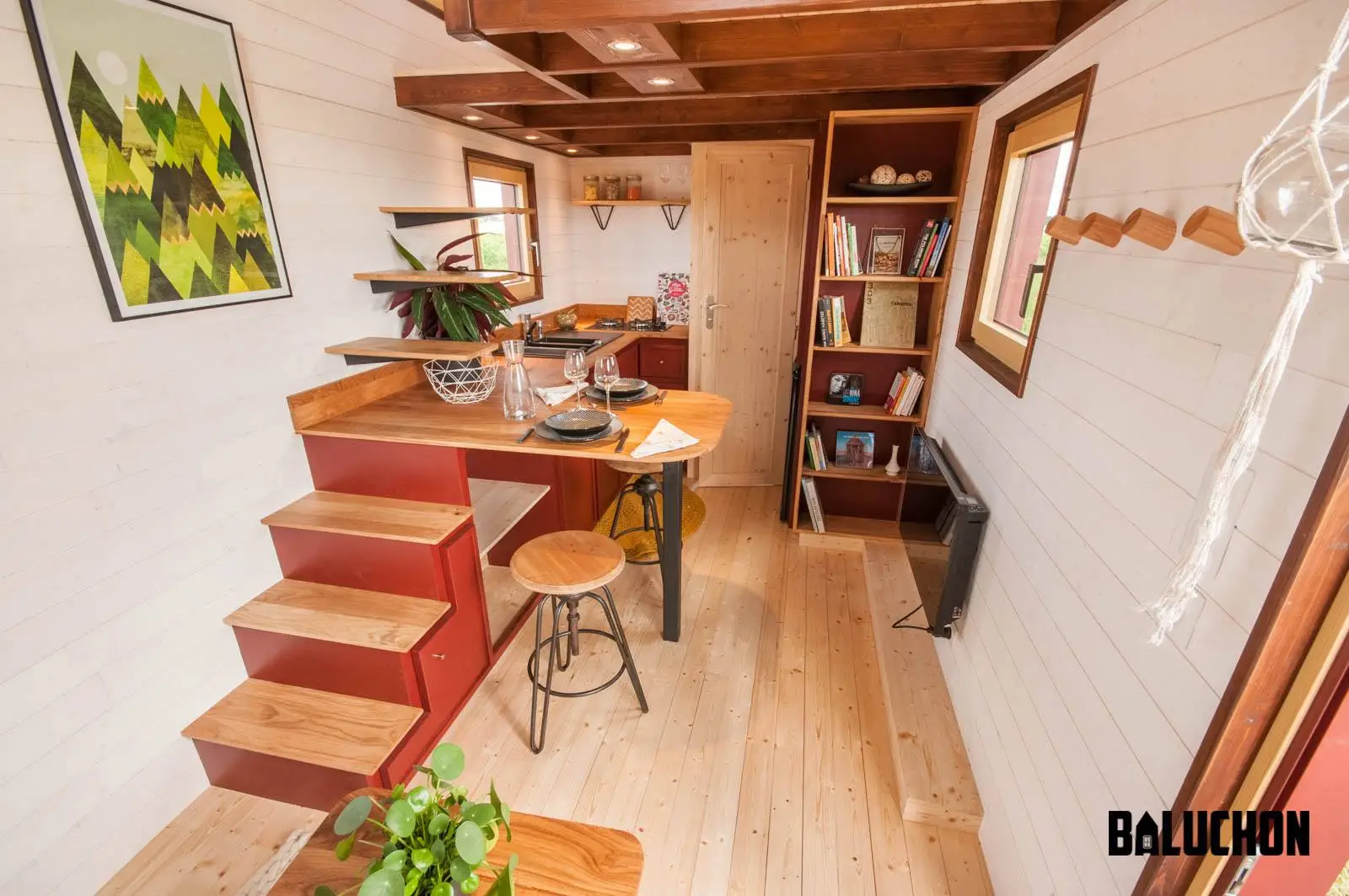 The Pampille's loft bedroom is reached by storage-integrated staircase