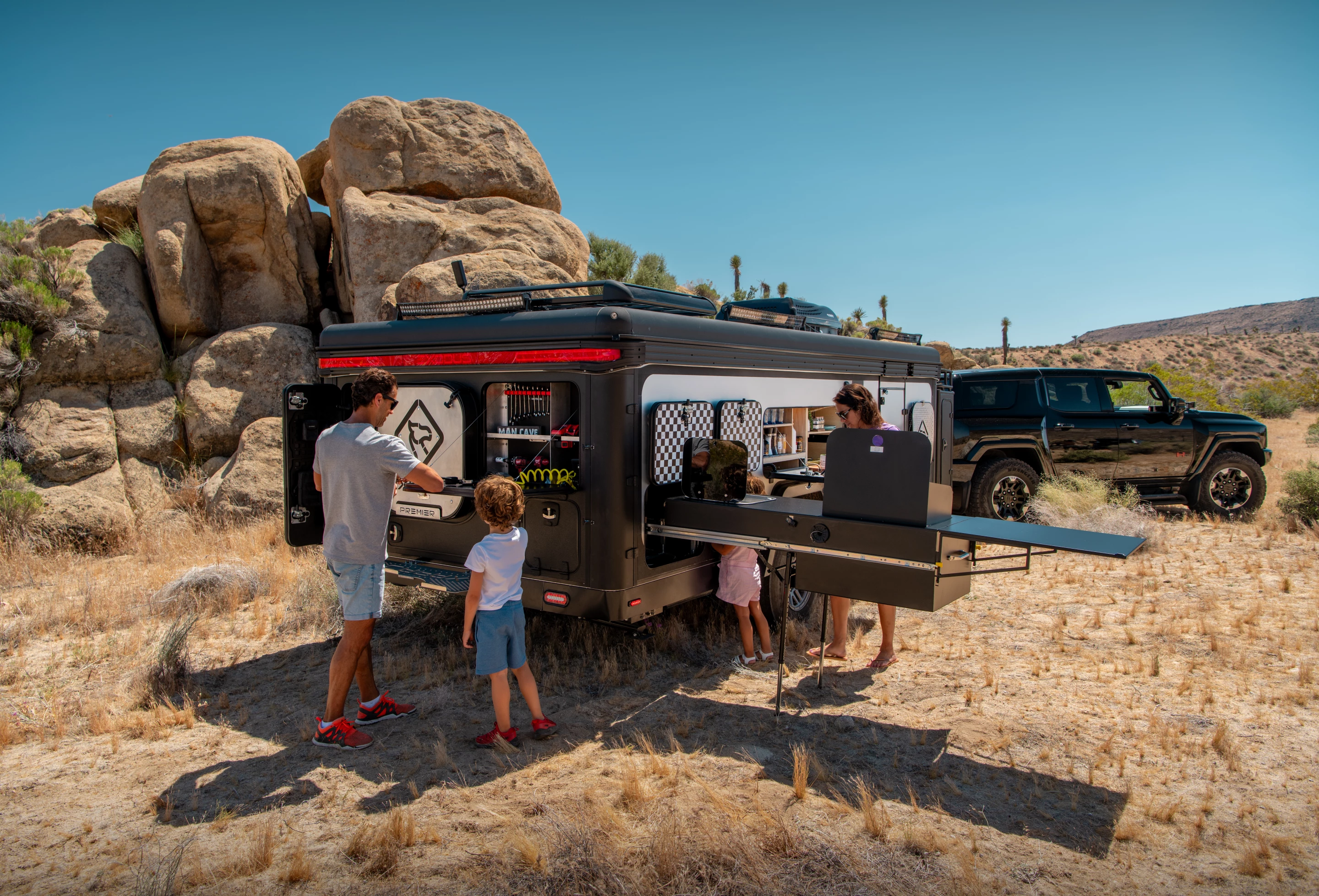 The Capax exterior cabinets and hatches are designed to be accessed whether it's set up in camp mode or dropped into drive mode