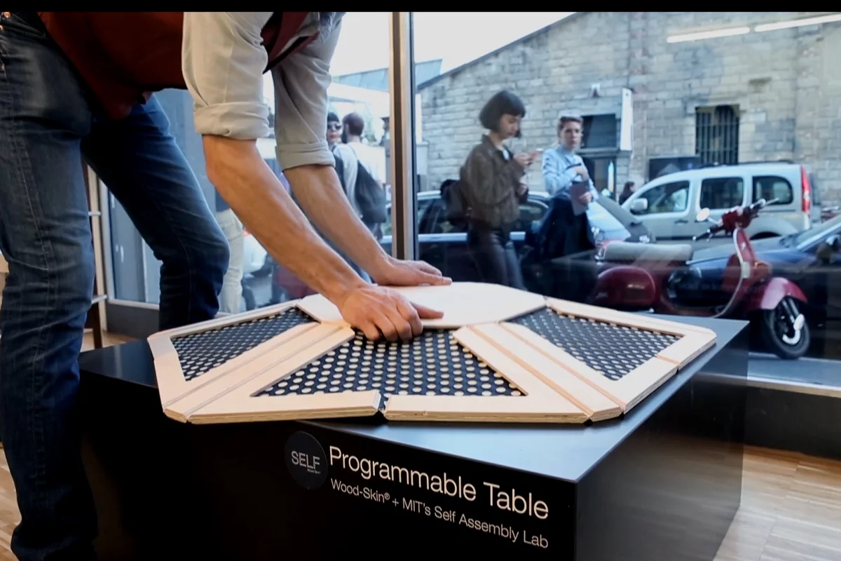 The Programmable Table pops into shape with a pull (Photo: Self-Assembly Lab, MIT + Wood-Skin S.r.I. + BIESSE)