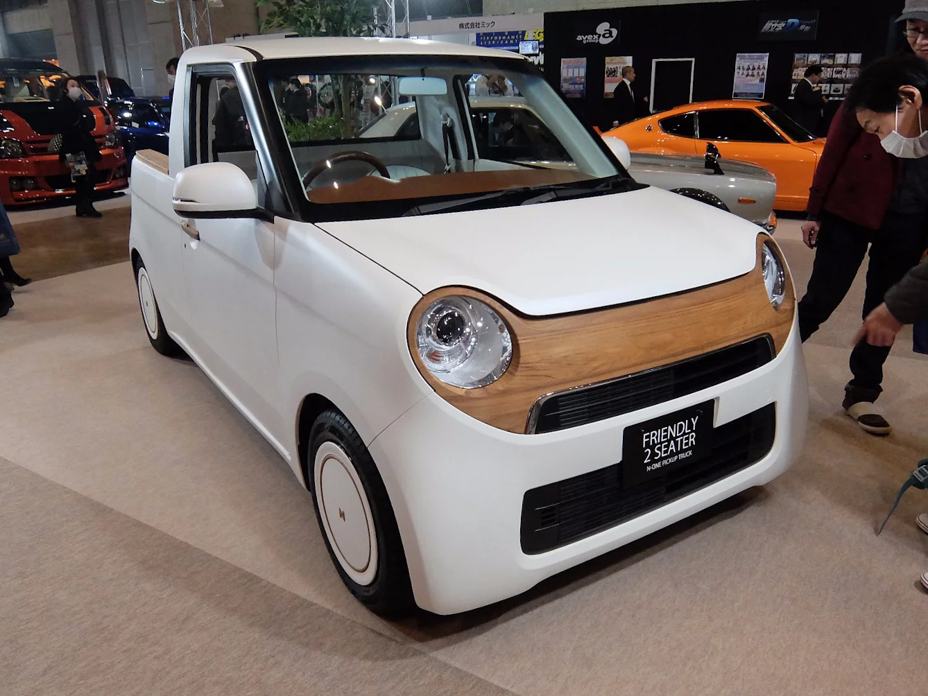 Real wood is used for the front face as well as being applied to rear deck