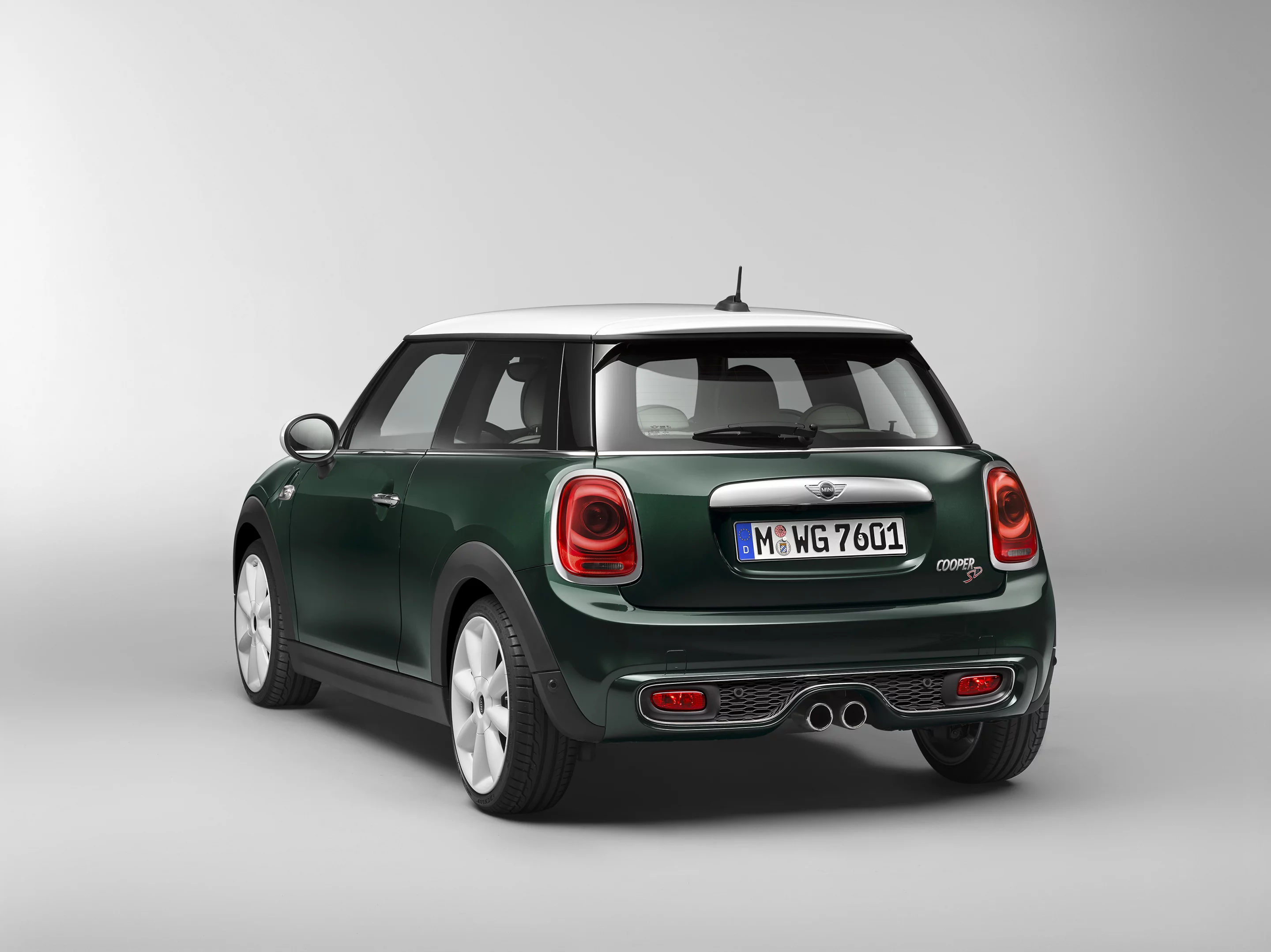 The Mini Cooper SD sports a hood scoop, big fog lights, 17-inch alloy wheels and a set of twin central tailpipes at the rear
