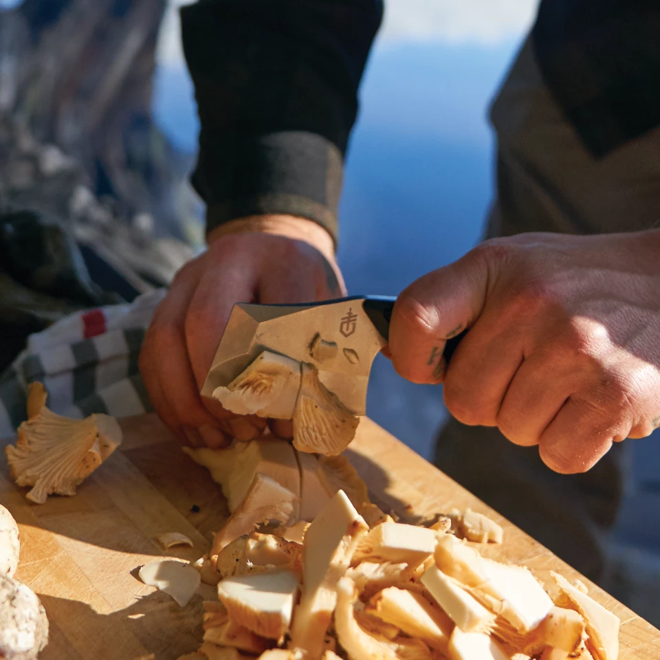 Doing some cutting with the Tri-Tip mini cleaver