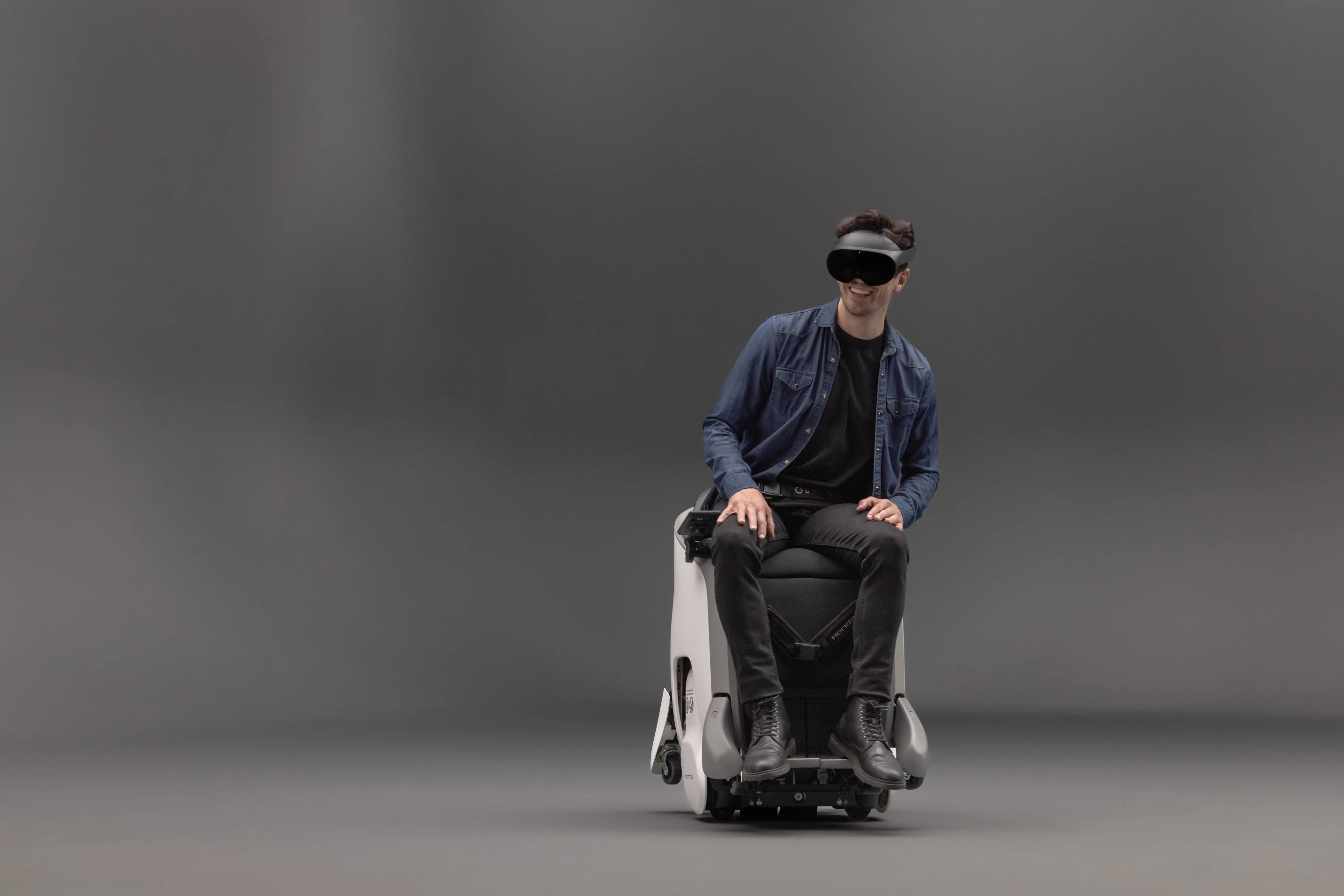 Honda sees the Uni-One and VR headset combo being used in clutter-free spaces at theme parks or shopping malls