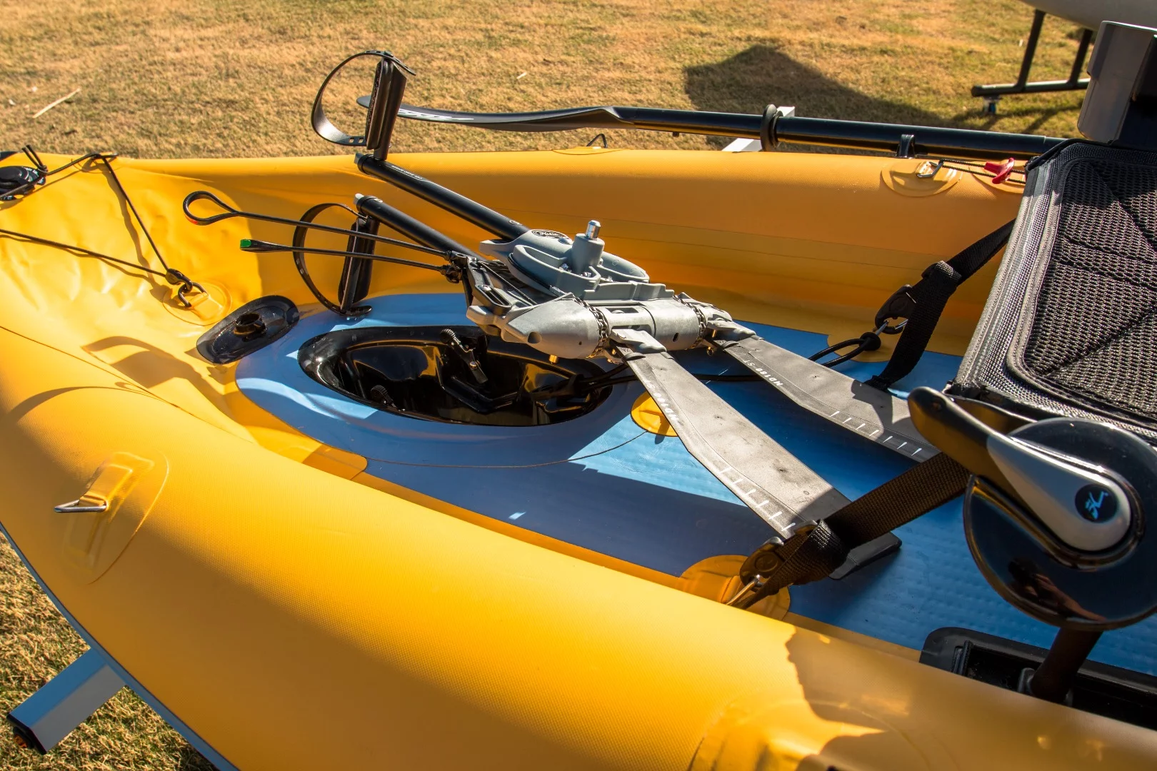 The MirageDrive 180 pedal system sitting atop the Mirage Inflatable 9 kayak. It's revolutionary design allows you to propel your kayak in forward or reverse with the pull of a cord