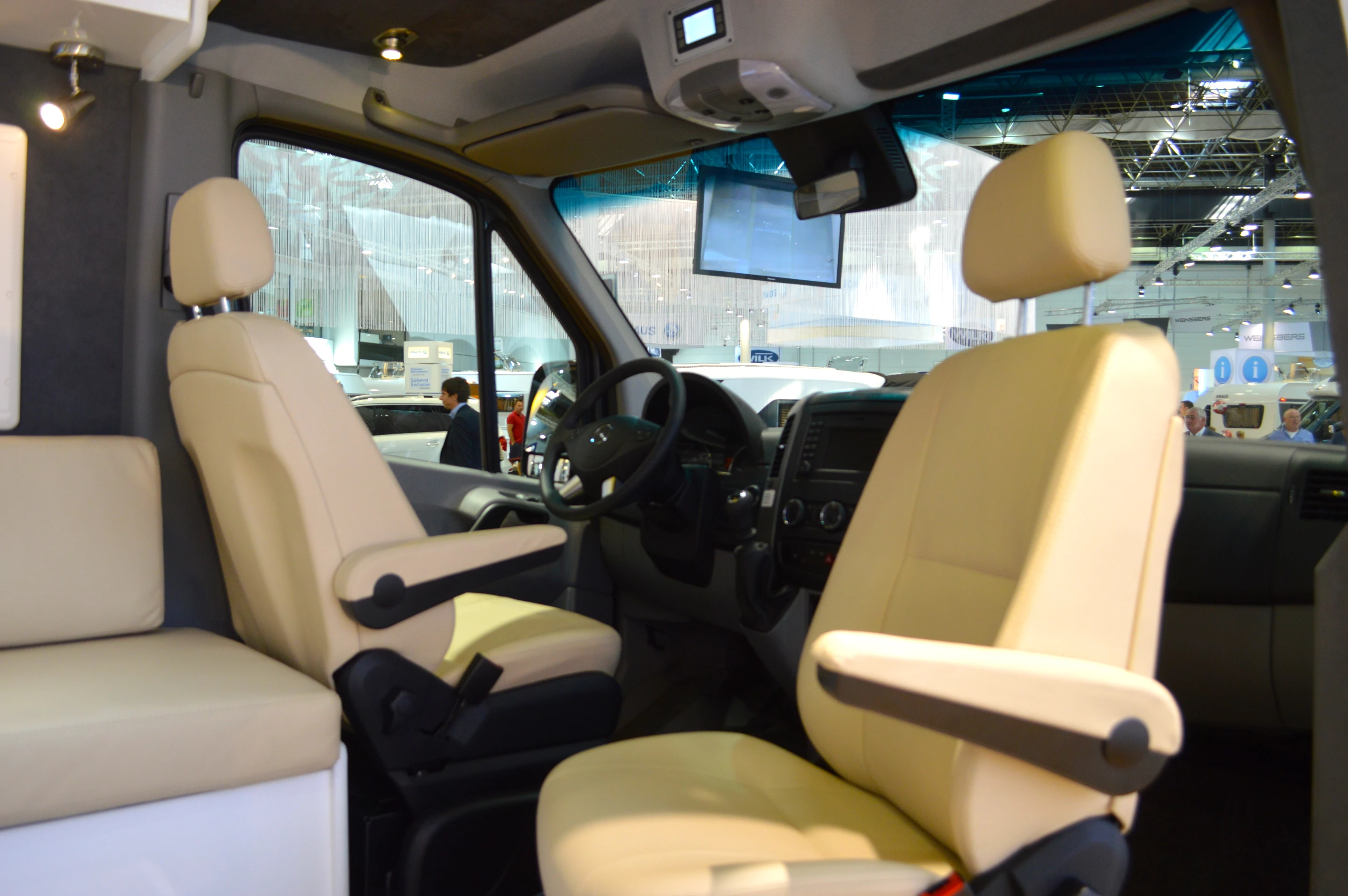 The front seats swivel around to face the camper cabin
