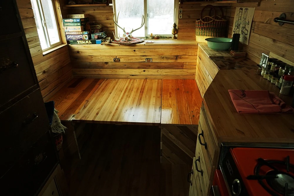 The Wheelie Shack's dining table folds out into a bed
