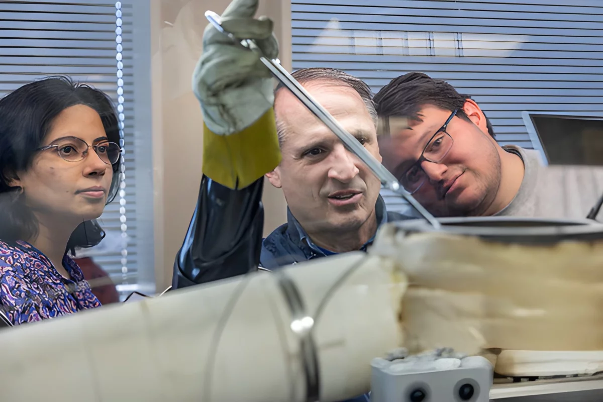 Members of the research team are seen here adding salt into the loop