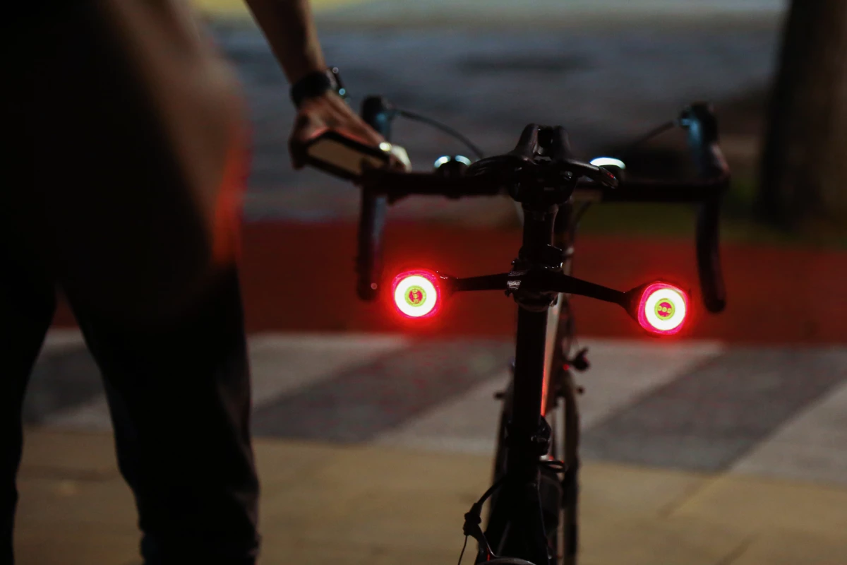 A bike equipped with the Lumos Firefly system, including an optional turn indicator mount