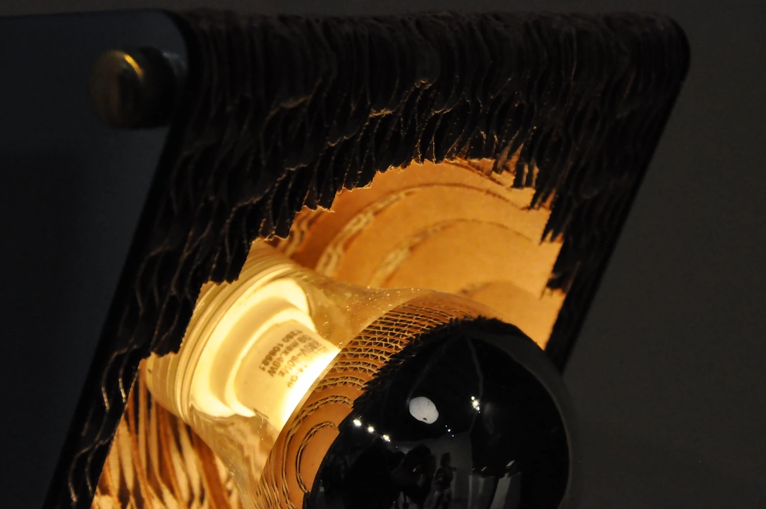Details from the cardboard lamp by Woodie Vlaire Id